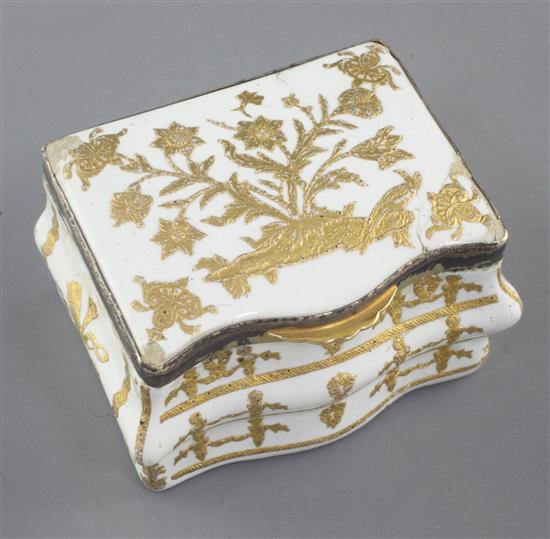 A late 18th / early 19th century French gilt metal mounted commode shaped white enamel snuff box, 3in.